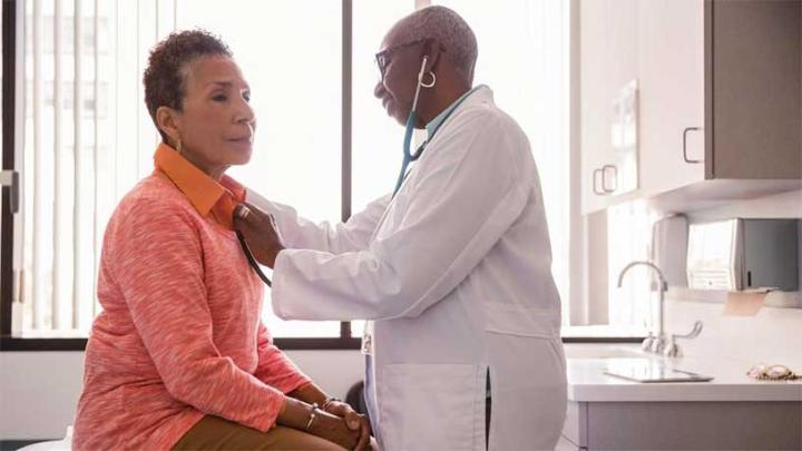 Woman with doctor